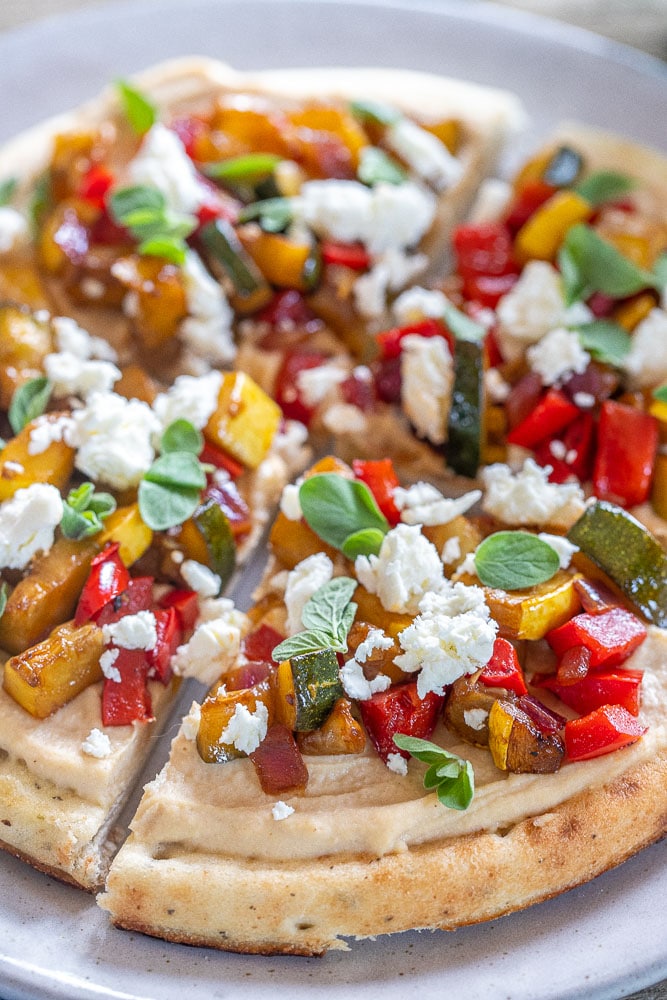 close up of a hummus flatbread