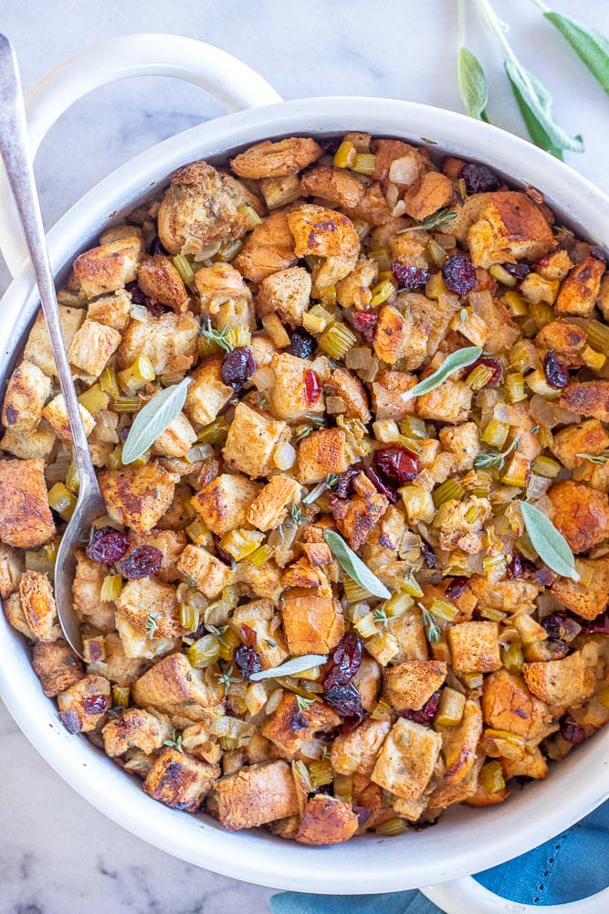 big dish of vegan stuffing with green apple and sage