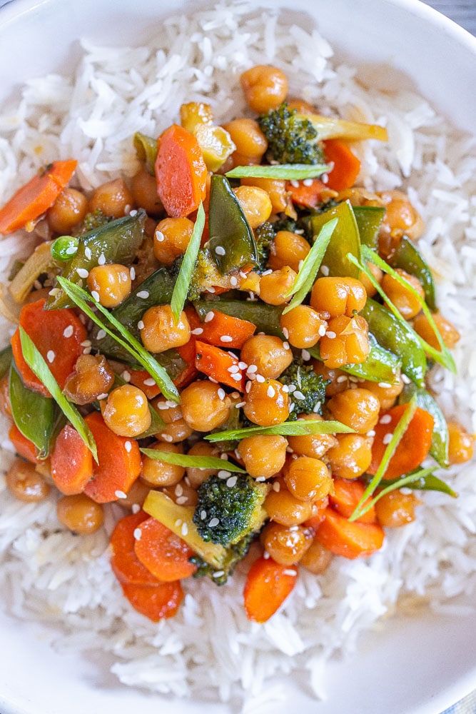 close up of a bowl of honey garlic chickpeas over rice
