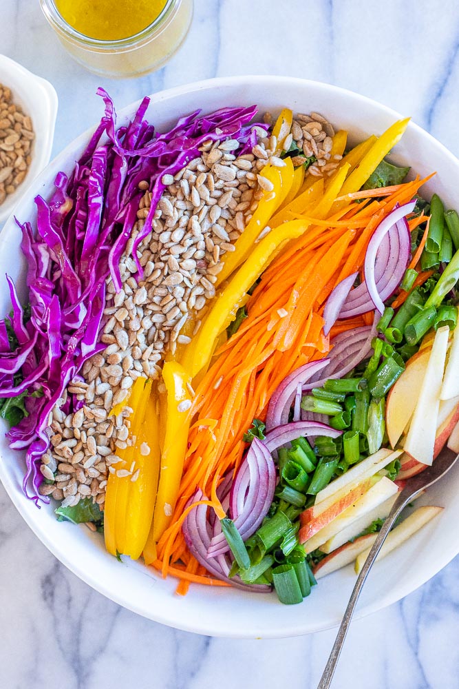 sunshine kale salad all assembled in a bowl