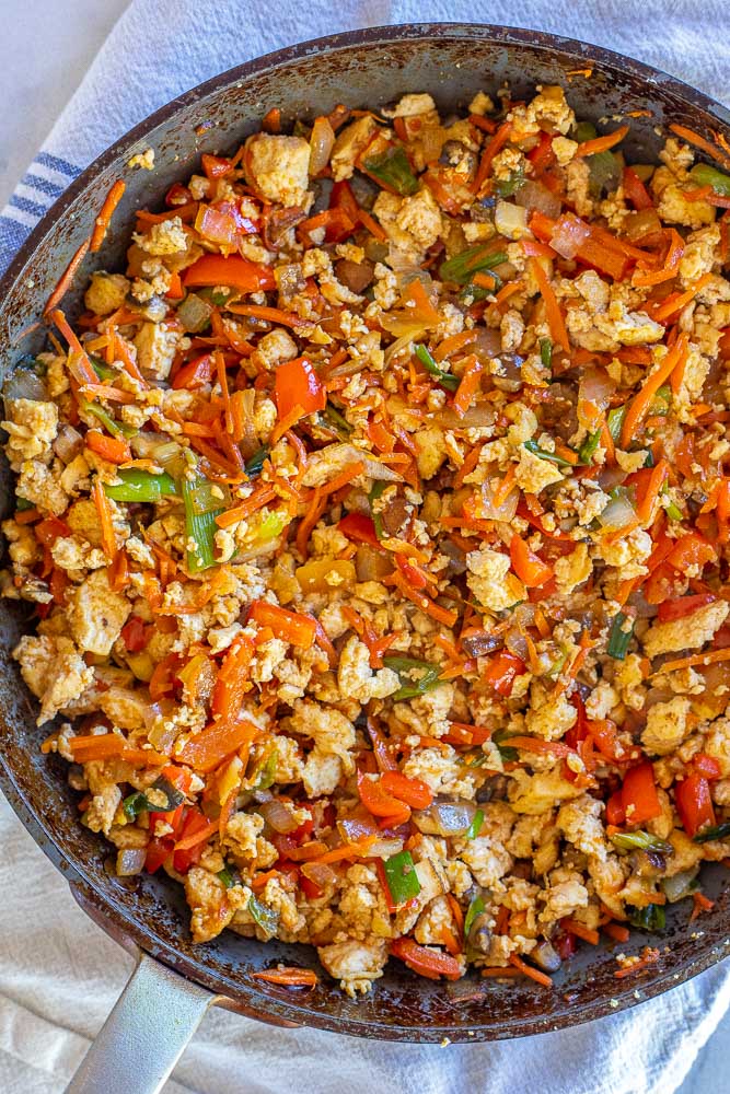 pan of tofu and vegetables with sauce