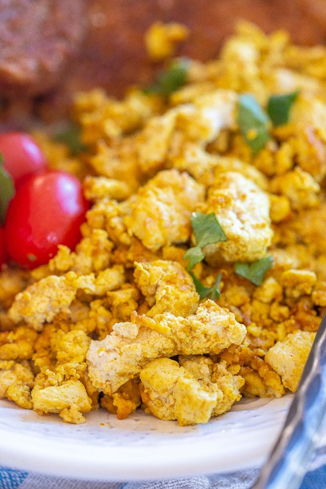 a close up of a bowl of tofu scramble