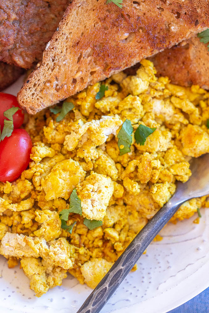 close up of a bowl of tofu breakfast scramble