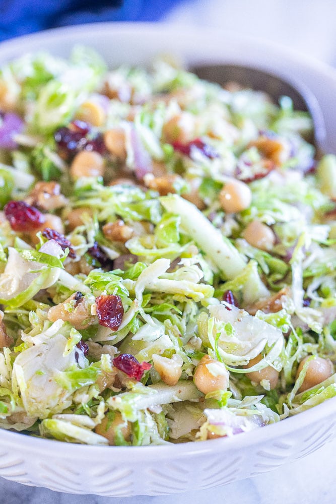 close up view of a healthy raw Brussels sprout salad