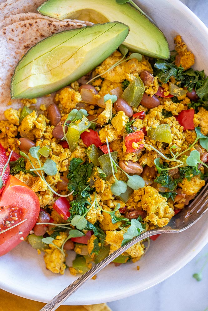 close up of a vegan breakfast bowl with toppings