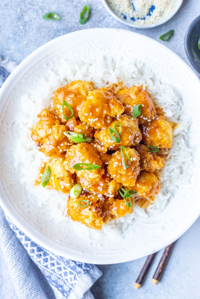 bowl of vegan orange chicken recipe made with cauliflower