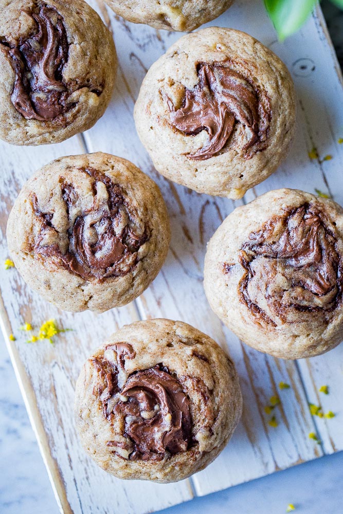 Banana Swirl Nutella Muffins on a cutting board