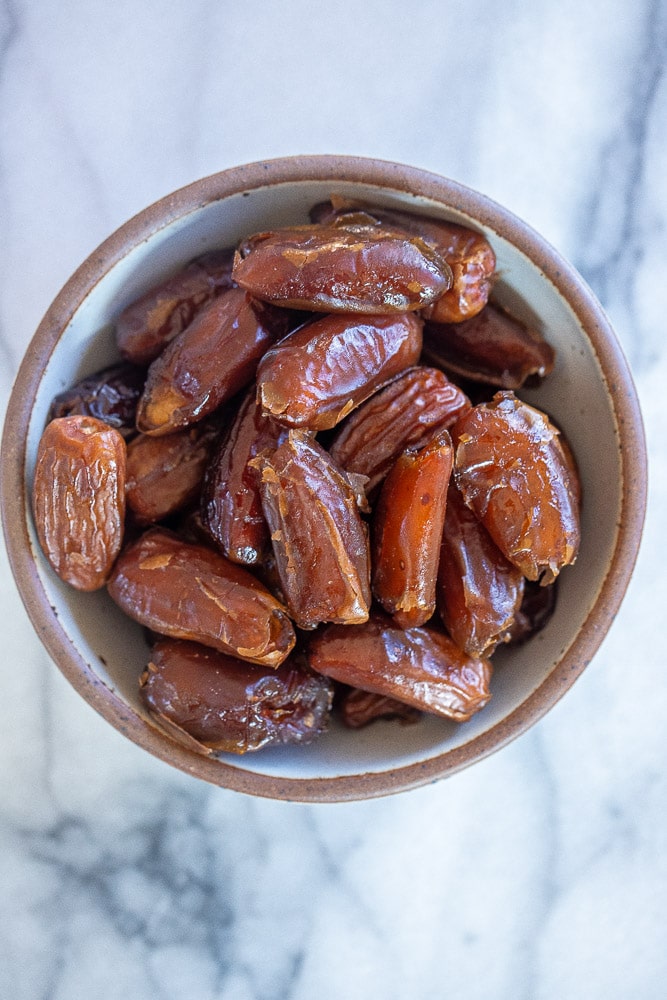 a bowl of medjool dates