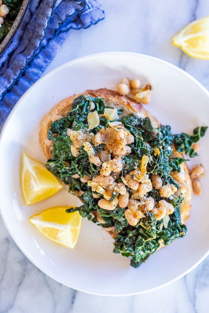 garlicky kale and white beans with lemon on toast