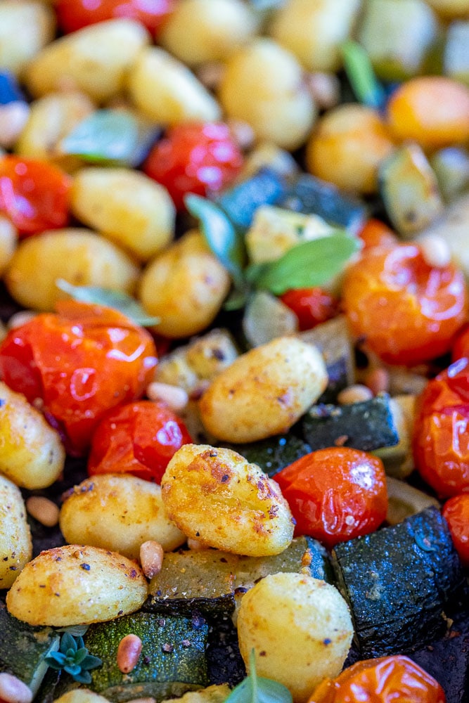 close up of crispy gnocchi baked on a sheet pan