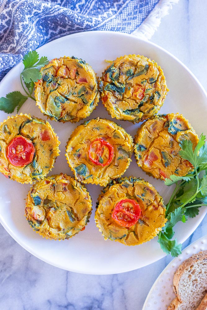 Vegan Egg Cups on a plate with tomato