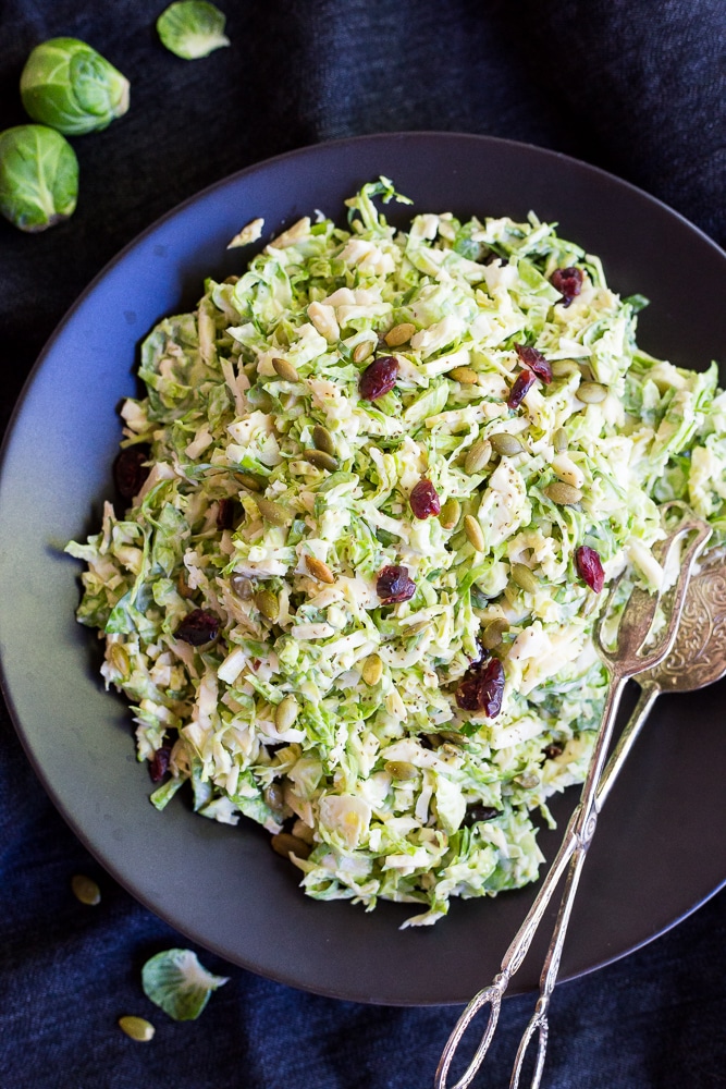 bowl of Brussels sprout slaw with dried cranberries