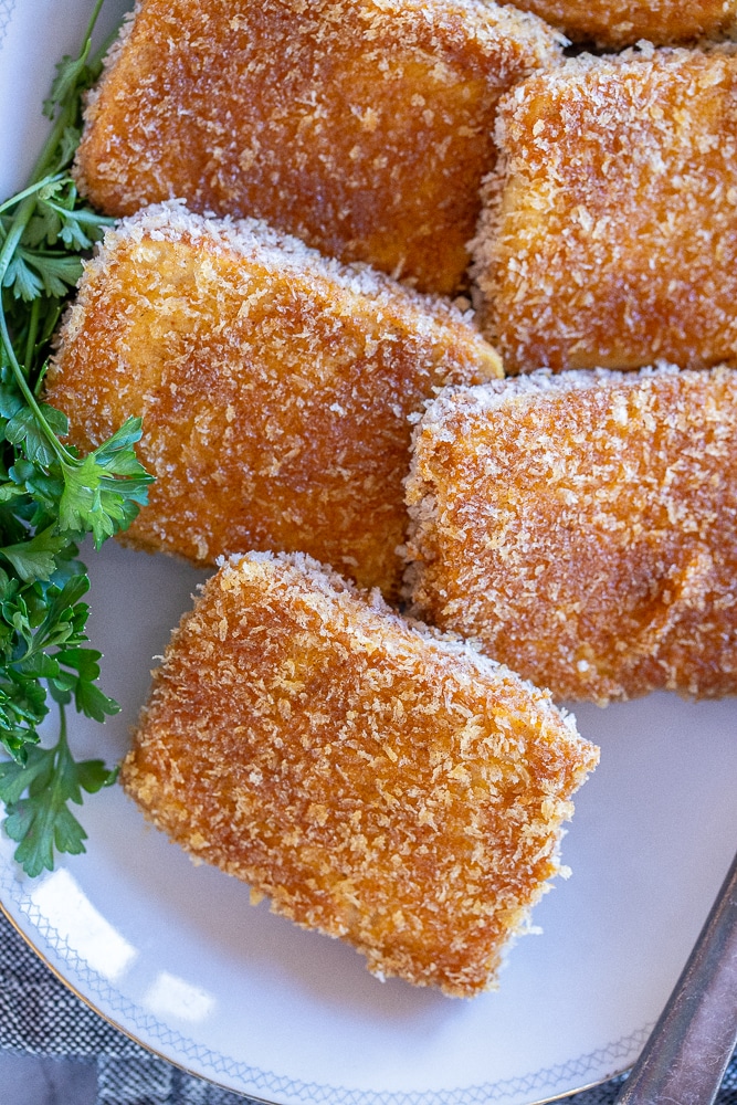 close up of crispy tofu on a platter