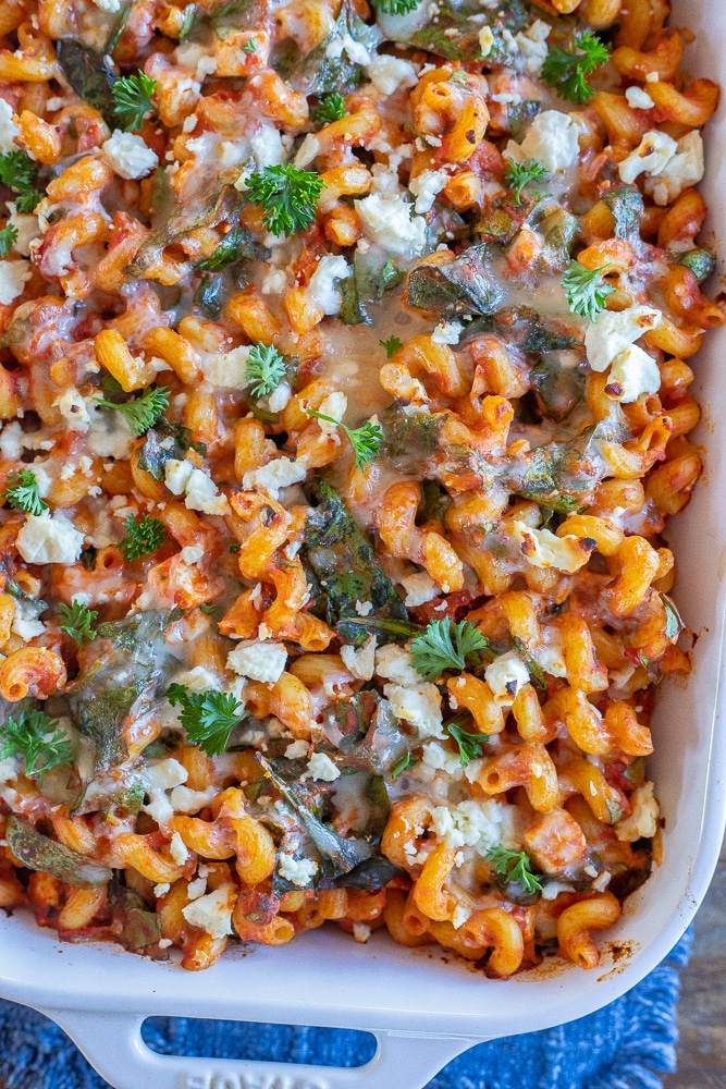 large pan of spinach and feta baked pasta