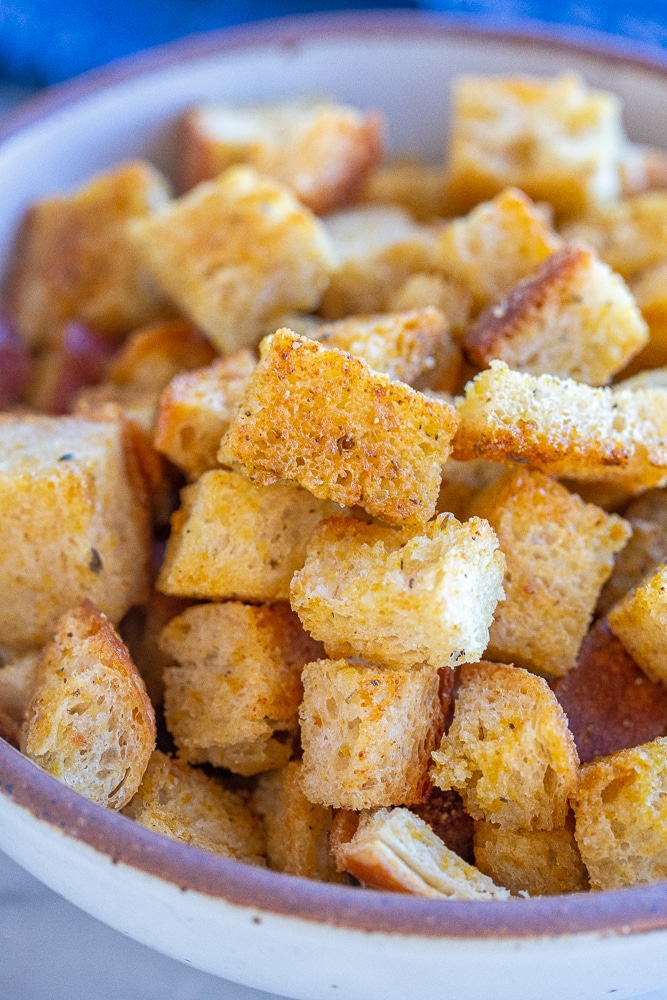 close up of a homemade crouton with garlic and herbs