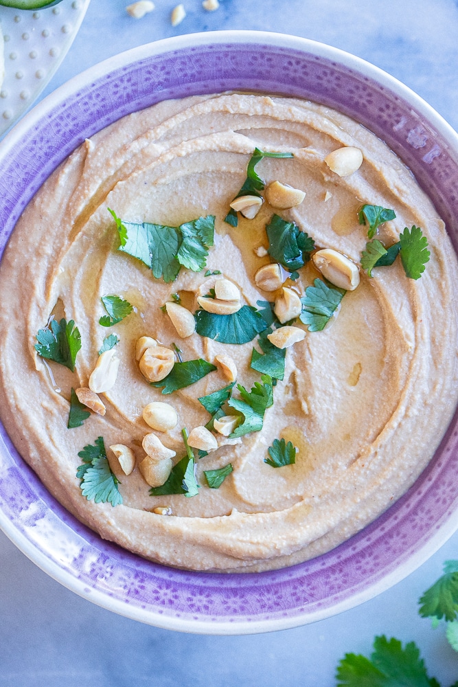 close up of a bowl of easy peanut butter hummus recipe