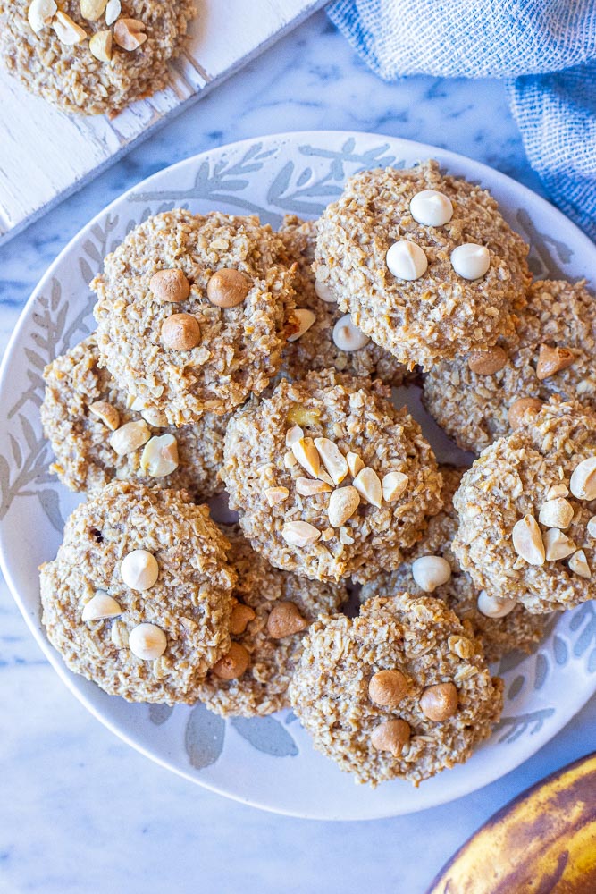 A plate of peanut butter banana cookies with different toppings