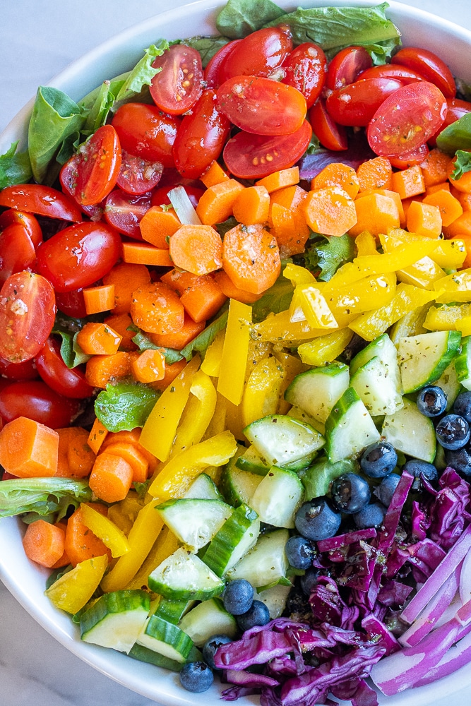 Close up of rainbow vegetable salad in a bowl