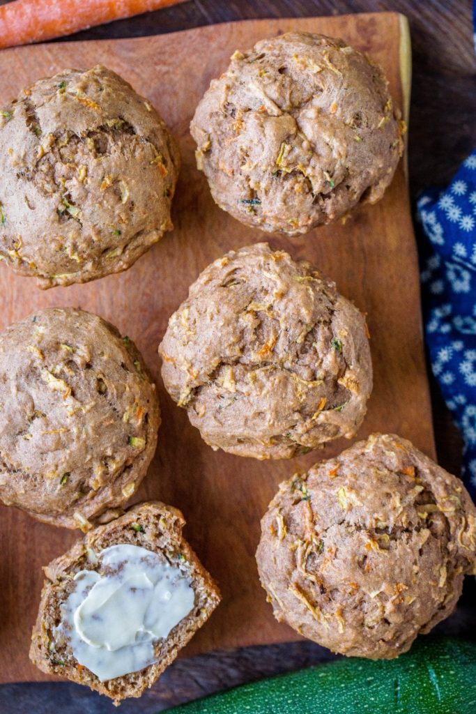 zucchini apple carrot muffins with butter
