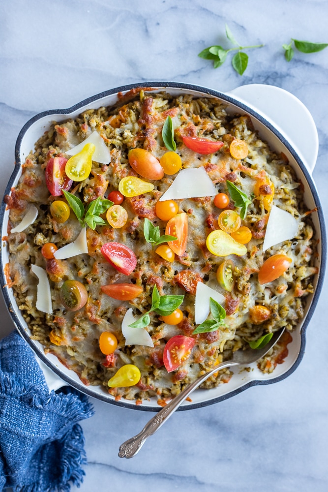 pan with baked pesto orzo with cherry tomatoes and feta cheese