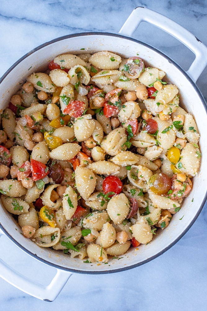Big pot of parmesan pasta with tomatoes and chickpeas