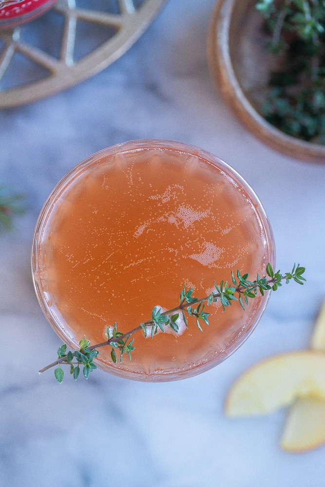 flat lay photo of apple cranberry mimosas