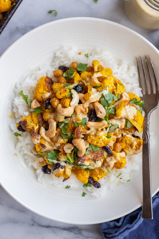 Golden Roasted Cauliflower with Coconut Curry Tahini Dressing She