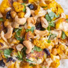 Golden Roasted Cauliflower with Coconut Curry Tahini Dressing-image