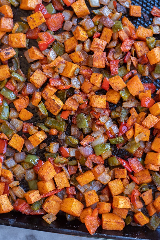 roasted sweet potato hash on a sheet pan