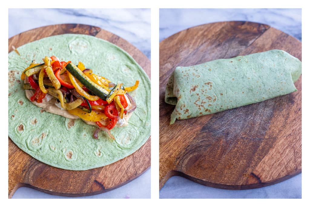 hummus and vegetables in the spinach wrap rolled up