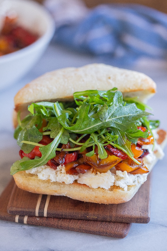 close up of a balsamic roasted sweet pepper Boursin sandwich