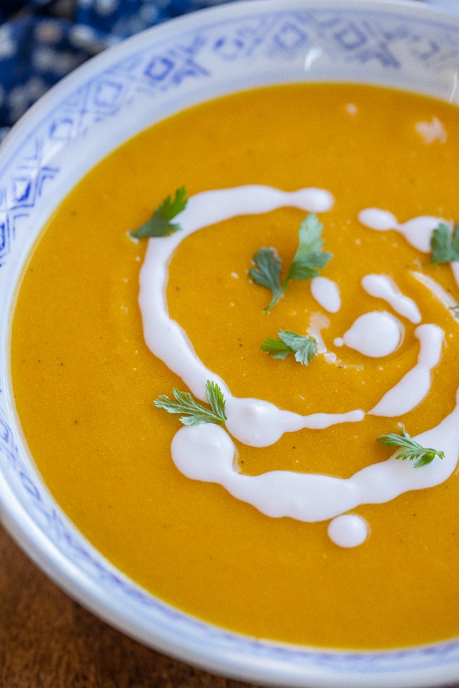 close up of a big bowl of curry roasted butternut squash soup