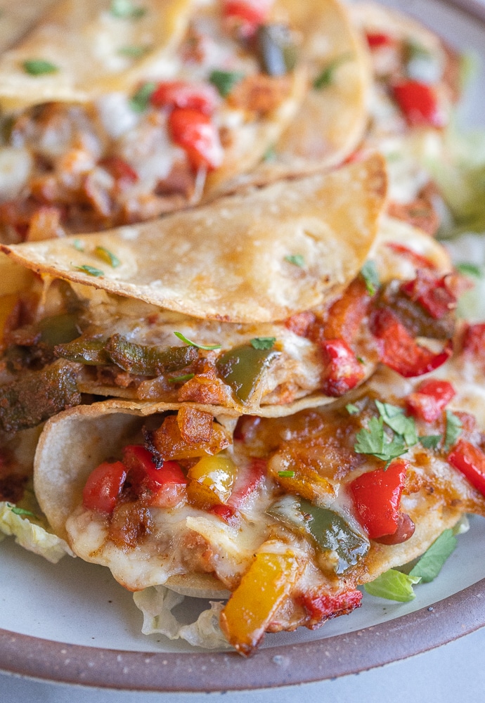 close up of cheesy baked fajita tacos