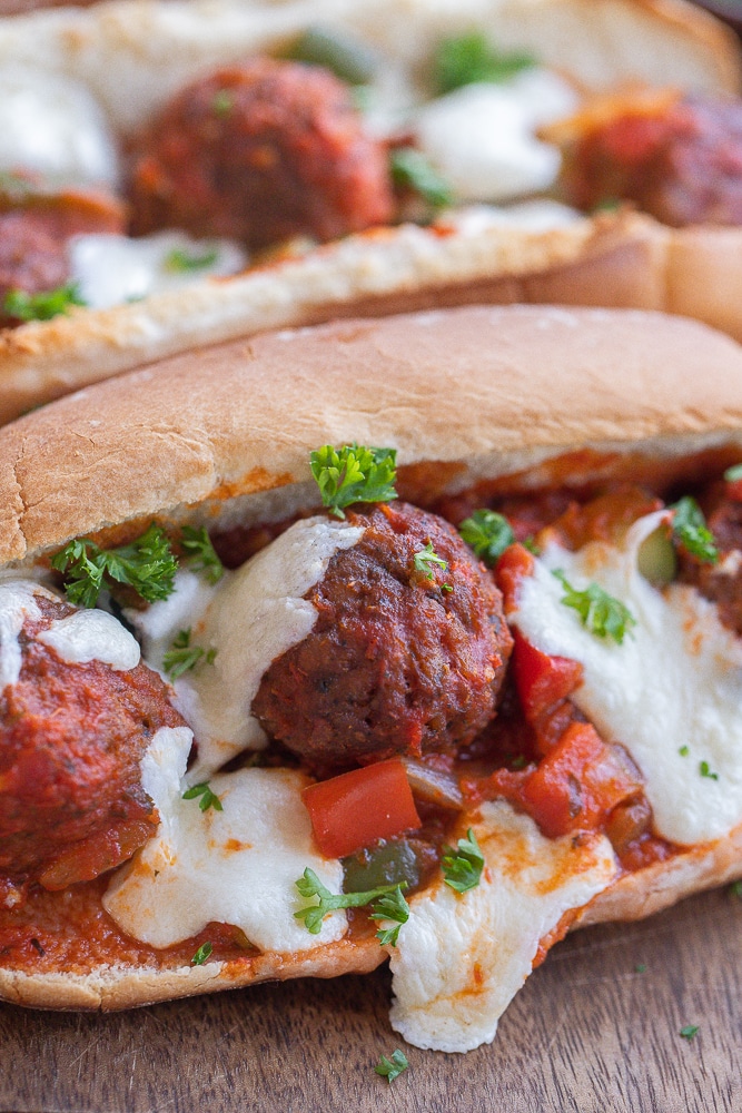 close up of a plant based meatball sub sandwich