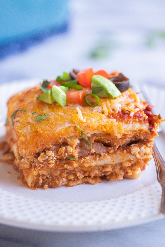 close up of a slice of Vegetarian Soft Taco Casserole on a plate