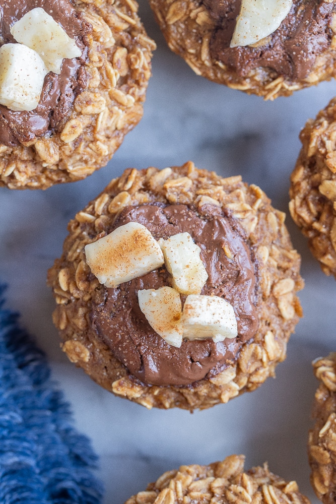 nutella banana baked oatmeal cups on a tray together