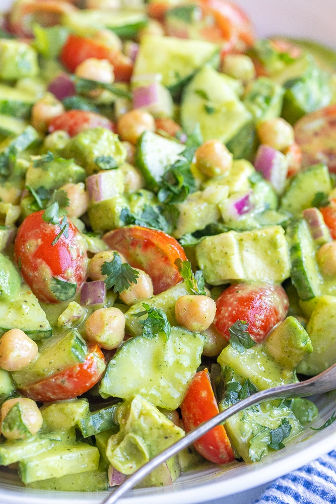 close up of a bowl of refreshing cilantro lime cucumber salad