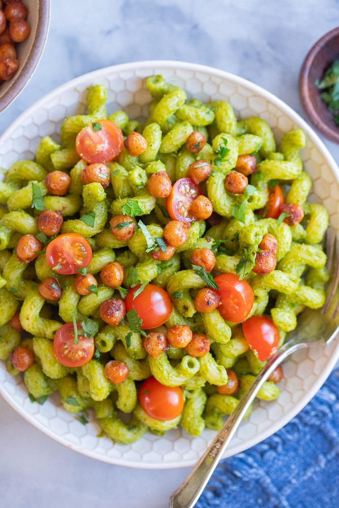 a bowl of Herby Lemon Jalapeno Pasta with crispy chickpeas and cherry tomatoes