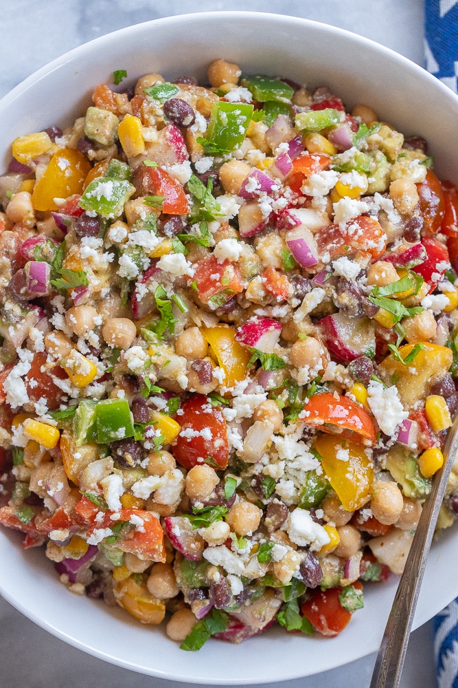 black bean salad recipe with queso fresco in a serving bowl