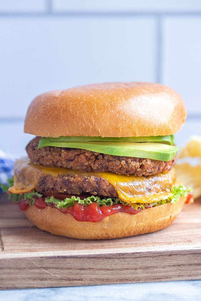 close up of a black bean smash burger with toppings for fourth of July