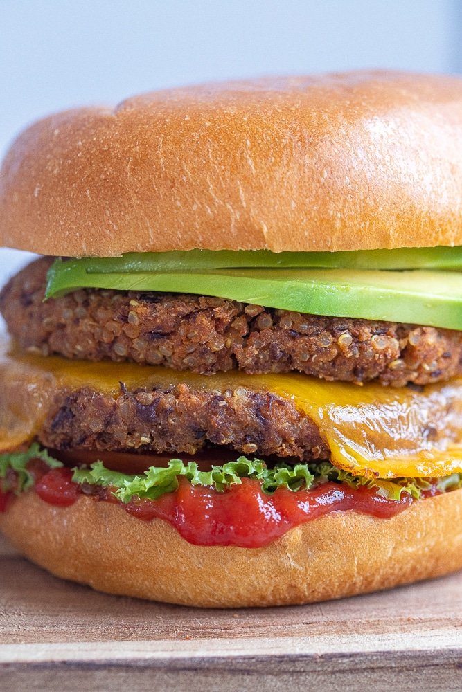 close up of a black bean smash burger with toppings