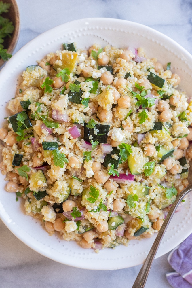 summer quinoa salad in a bowl with zucchini