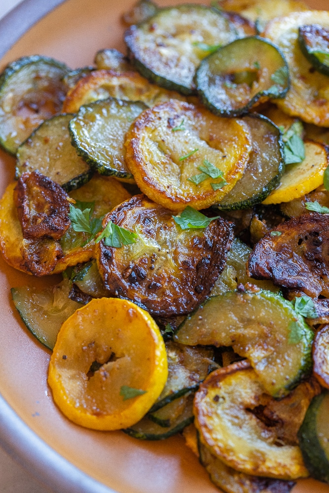 close up of a caramelized zucchini with summer squash