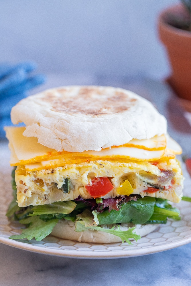 a vegetarian breakfast sandwich on an English muffin
