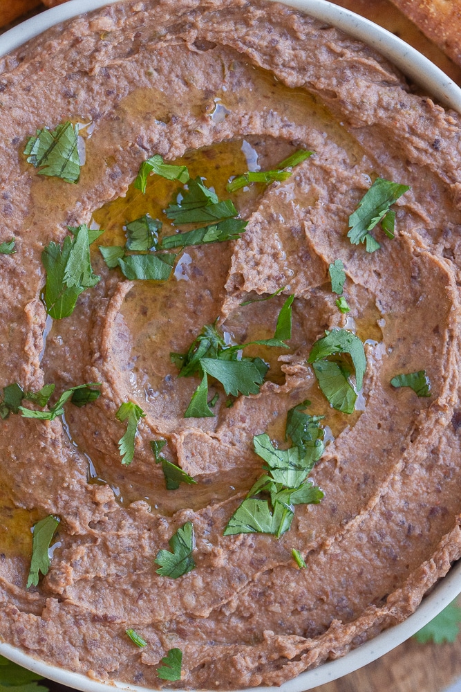 close up of a bowl of black bean dip