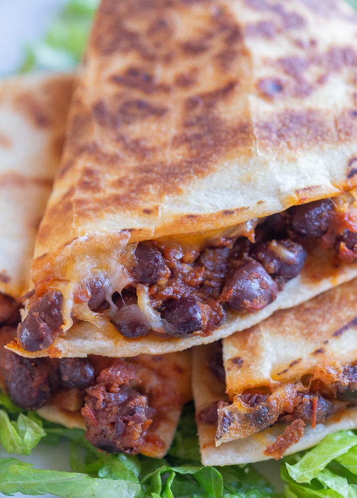 close up of a BBQ Black Bean Quesadilla cut in half