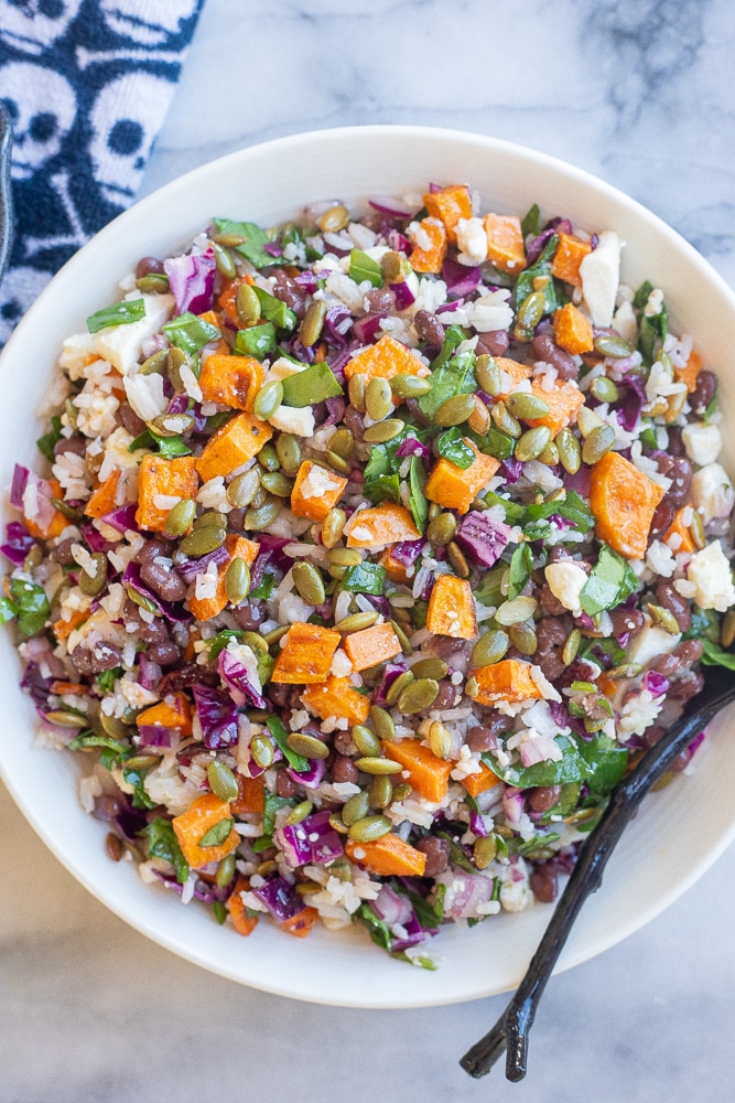 halloween colored veggie salad in a serving bowl