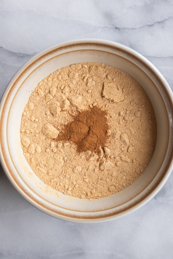 bowl of blended dried apples with spices mixed in