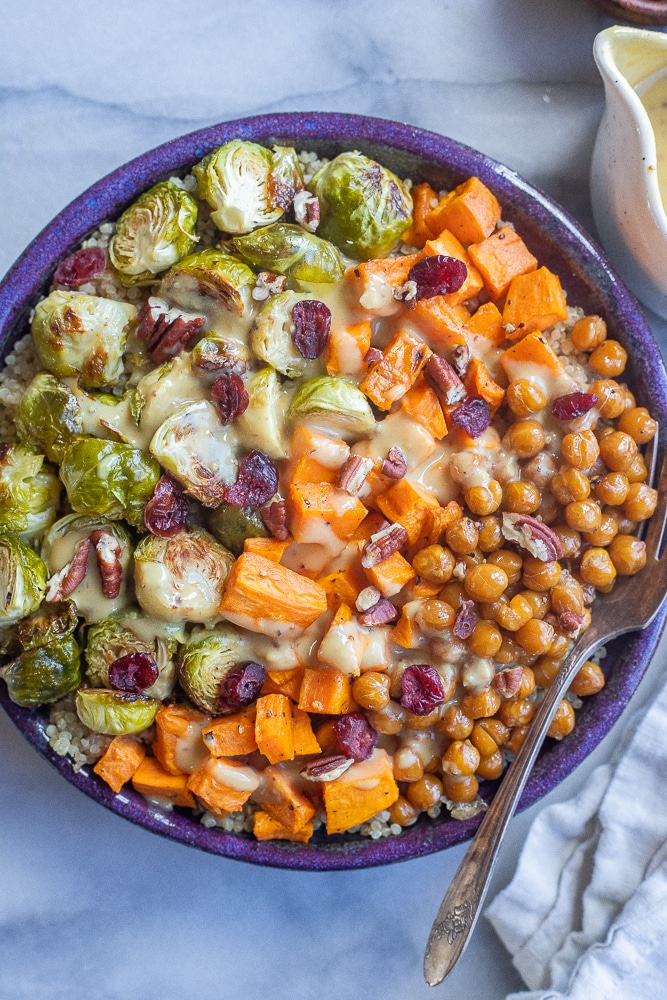 quinoa bowl with roasted brussels sprouts, sweet potato and chickpeas