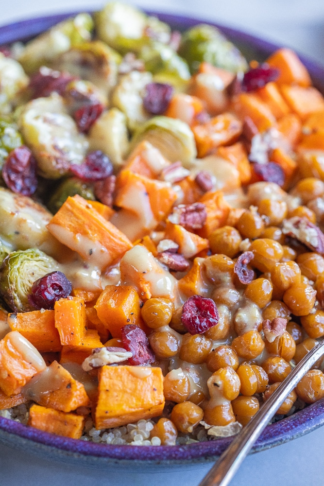 close up of these healthy vegan quinoa bowls with tahini mustard dressing
